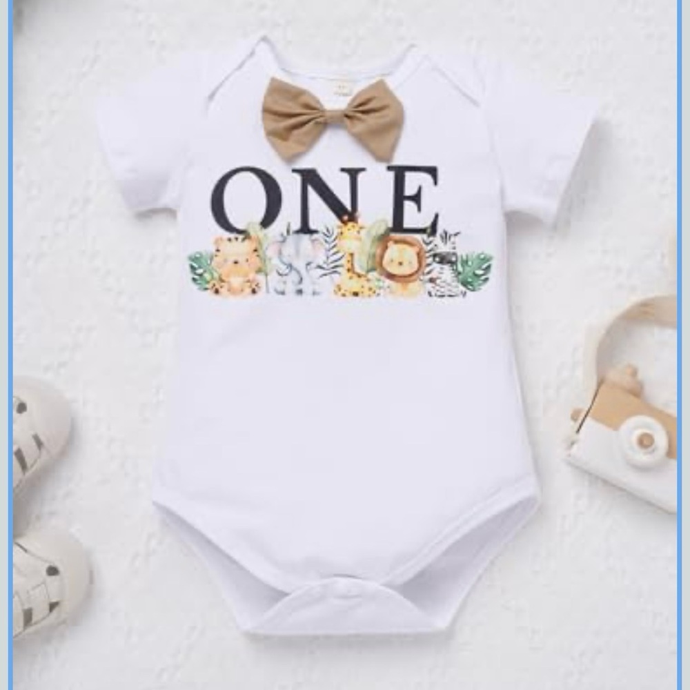 Charming White Baby Bodysuit with Tan Bow